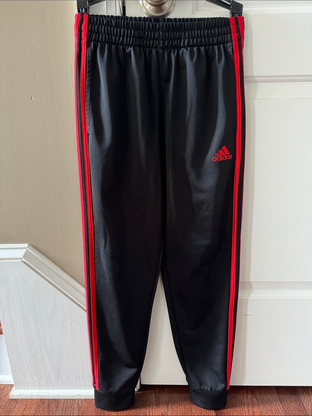 adidas Kids Black Joggers with Red Side Stripes